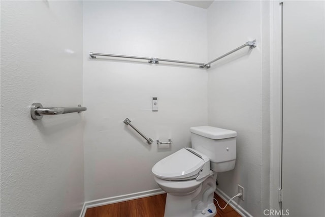 2385 Via Mariposa Unit 1F, Laguna Woods, CA 92637 - bathroom featuring wood finished floors and toilet