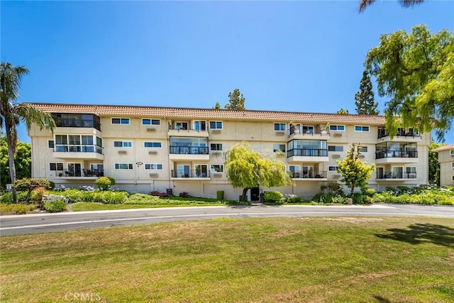 2385 Via Mariposa Unit 1F, Laguna Woods, CA 92637 - view of apartment building / complex