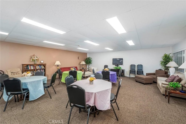 2385 Via Mariposa Unit 1F, Laguna Woods, CA 92637 - dining area featuring light colored carpet and a paneled ceiling