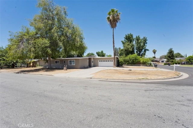 4001 Rinker Way, Bakersfield, CA 93309 - view of front of house featuring driveway and an attached garage