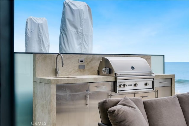 35411 Beach Rd, Dana Point, CA 92624 - view of patio with an outdoor kitchen and a water view