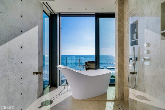 35411 Beach Rd, Dana Point, CA 92624 - bathroom with a freestanding bath, expansive windows, a water view, and a shower