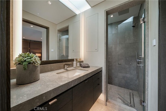 35411 Beach Rd, Dana Point, CA 92624 - bathroom featuring vanity, a shower stall, and recessed lighting