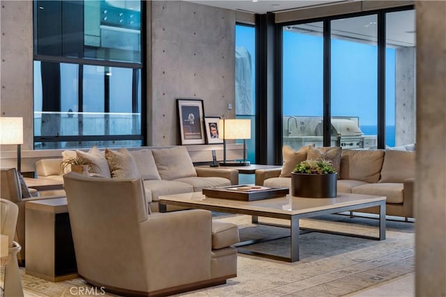 35411 Beach Rd, Dana Point, CA 92624 - living room with floor to ceiling windows, healthy amount of natural light, and wood finished floors