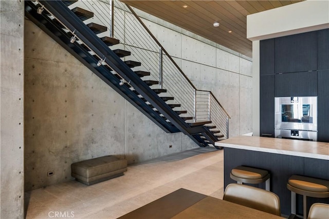 35411 Beach Rd, Dana Point, CA 92624 - stairs featuring wooden ceiling