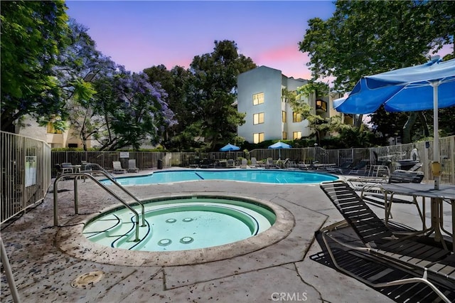 8210 Summertime Ln Unit 210, Culver City, CA 90230 - pool at dusk with a community pool, a patio, and a community hot tub