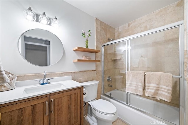 8210 Summertime Ln Unit 210, Culver City, CA 90230 - full bathroom featuring tile walls, vanity, and combined bath / shower with glass door