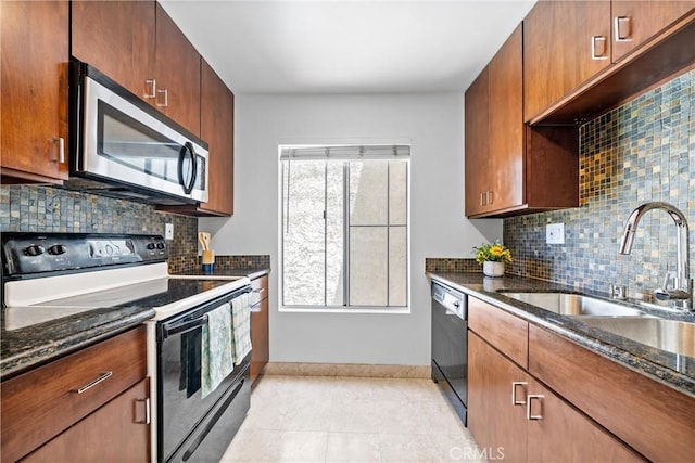 8210 Summertime Ln Unit 210, Culver City, CA 90230 - kitchen featuring electric range oven, stainless steel microwave, black dishwasher, and dark stone counters