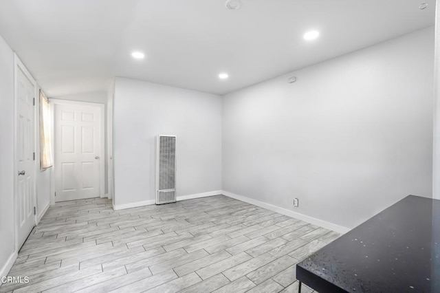 136 N Garfield Ave, Oxnard, CA 93030 - empty room with a heating unit, light wood-style floors, and recessed lighting