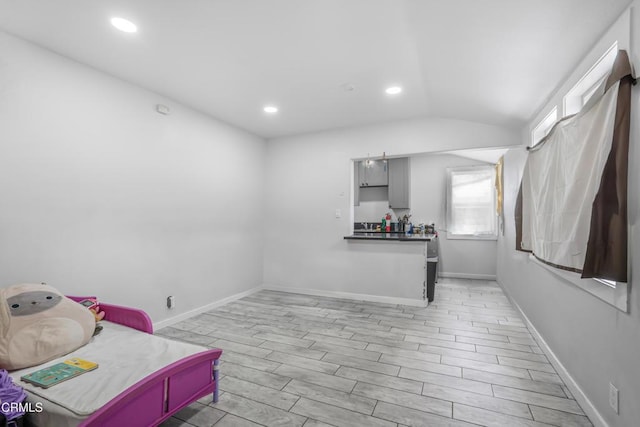 136 N Garfield Ave, Oxnard, CA 93030 - living area with vaulted ceiling, light wood-style flooring, and recessed lighting