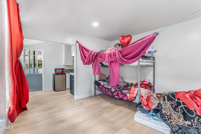 136 N Garfield Ave, Oxnard, CA 93030 - bedroom featuring light wood-style floors, recessed lighting, and vaulted ceiling