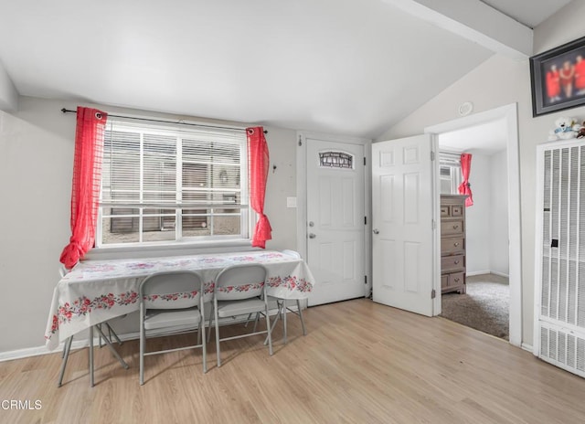 136 N Garfield Ave, Oxnard, CA 93030 - dining area with a heating unit, wood finished floors, and lofted ceiling
