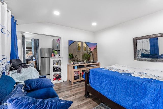 136 N Garfield Ave, Oxnard, CA 93030 - bedroom featuring freestanding refrigerator, wood finished floors, and recessed lighting
