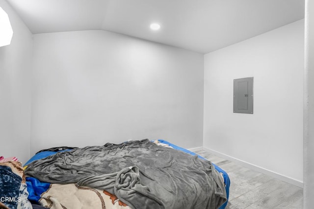 136 N Garfield Ave, Oxnard, CA 93030 - bedroom featuring electric panel, wood finished floors, vaulted ceiling, and recessed lighting