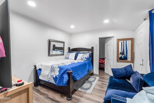 136 N Garfield Ave, Oxnard, CA 93030 - bedroom featuring wood finished floors, recessed lighting, and vaulted ceiling