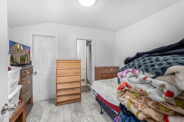 136 N Garfield Ave, Oxnard, CA 93030 - bedroom featuring light wood finished floors and vaulted ceiling