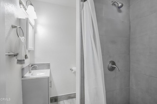 136 N Garfield Ave, Oxnard, CA 93030 - full bathroom with vanity and a tile shower