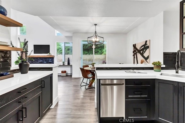 37 Conch Reef, Aliso Viejo, CA 92656 - kitchen with a peninsula, light countertops, light wood-type flooring, and open shelves