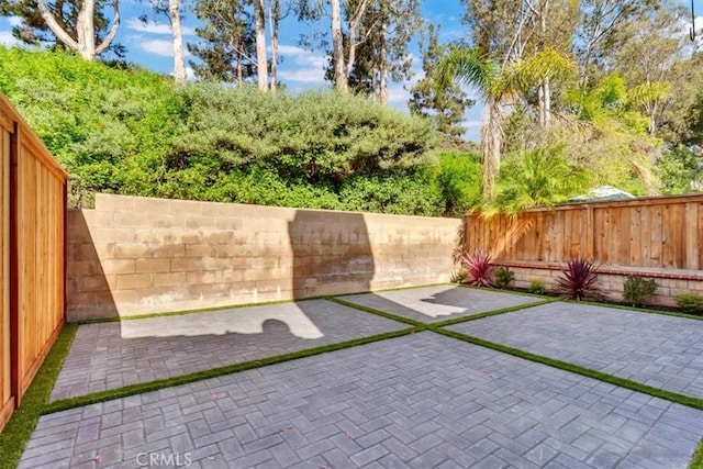 37 Conch Reef, Aliso Viejo, CA 92656 - fenced backyard with a patio area