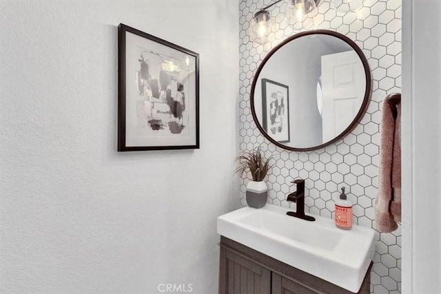 37 Conch Reef, Aliso Viejo, CA 92656 - bathroom with tile walls, vanity, and decorative backsplash