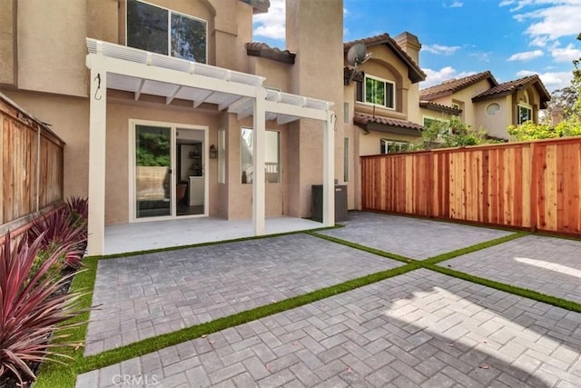 37 Conch Reef, Aliso Viejo, CA 92656 - rear view of house with a patio area, stucco siding, a chimney, and a tile roof