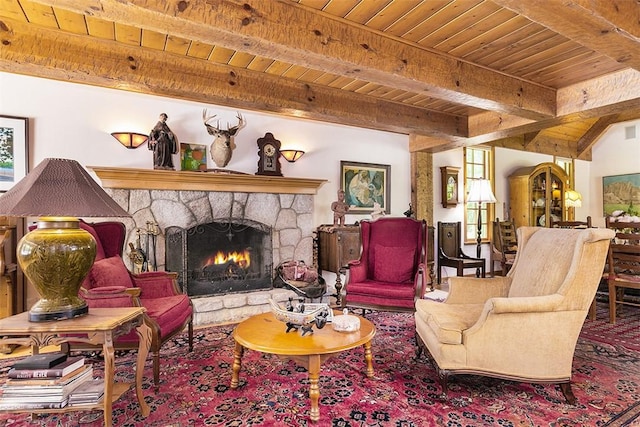 28971 N Shore Rd, Lake Arrowhead, CA 92352 - carpeted living room featuring a wooden ceiling with exposed beams and a fireplace