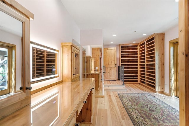 28971 N Shore Rd, Lake Arrowhead, CA 92352 - wine room featuring light wood-style flooring and recessed lighting