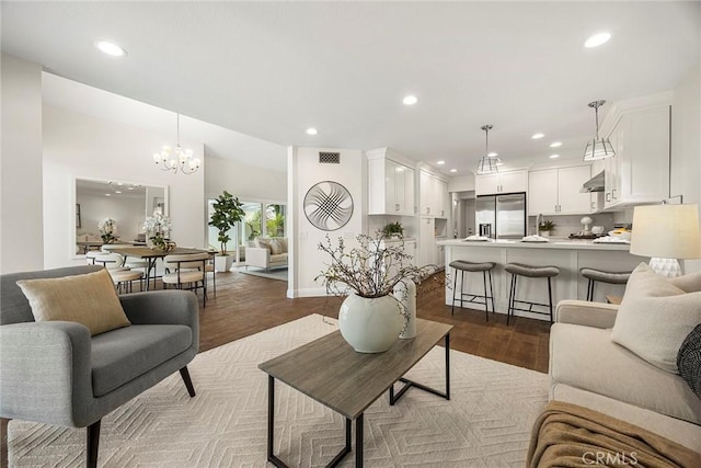 28245 Via Alfonse, Laguna Niguel, CA 92677 - living area with recessed lighting, dark wood-type flooring, and a chandelier