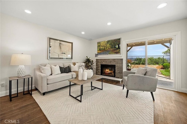 28245 Via Alfonse, Laguna Niguel, CA 92677 - living area featuring wood finished floors, recessed lighting, and a stone fireplace