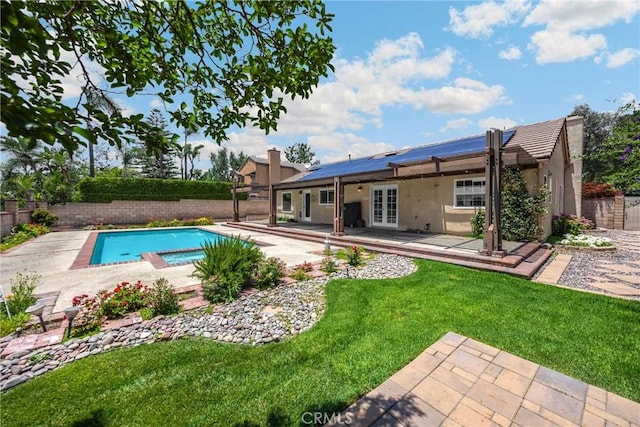 8291 Jennet St, Rancho Cucamonga, CA 91701 - view of pool featuring french doors, a fenced backyard, a patio area, and a pool with connected hot tub