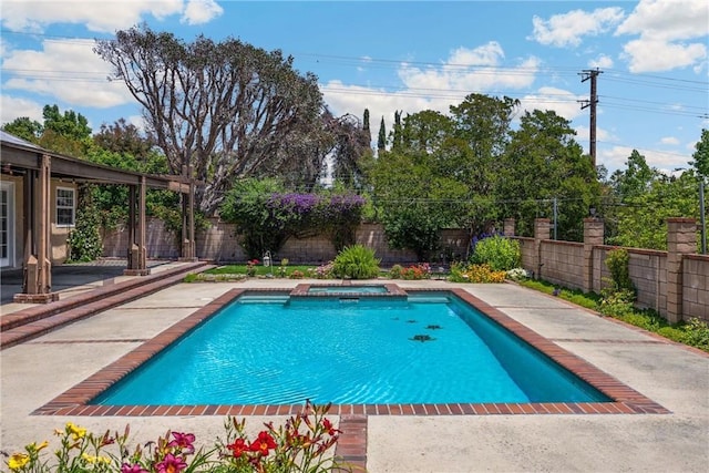 8291 Jennet St, Rancho Cucamonga, CA 91701 - view of swimming pool featuring a fenced backyard, a patio, and a pool with connected hot tub