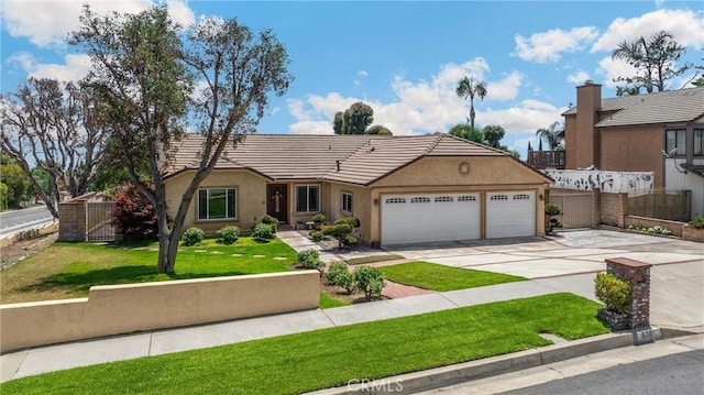 8291 Jennet St, Rancho Cucamonga, CA 91701 - ranch-style house with a garage, concrete driveway, and stucco siding