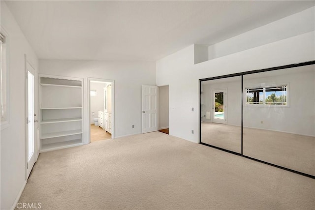 8291 Jennet St, Rancho Cucamonga, CA 91701 - unfurnished bedroom featuring lofted ceiling, carpet floors, ensuite bath, and a closet