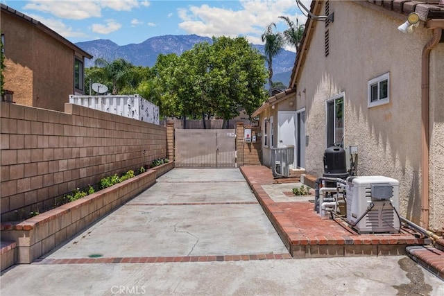 8291 Jennet St, Rancho Cucamonga, CA 91701 - view of yard with a mountain view, a gate, and a patio