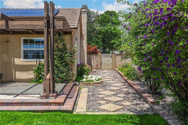 8291 Jennet St, Rancho Cucamonga, CA 91701 - view of yard with a gate and a patio area