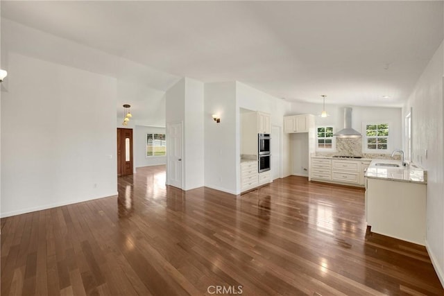 8291 Jennet St, Rancho Cucamonga, CA 91701 - unfurnished living room featuring dark wood-style flooring