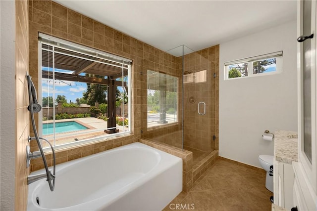 8291 Jennet St, Rancho Cucamonga, CA 91701 - bathroom with a bath, a stall shower, tile patterned flooring, and vanity