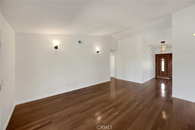 8291 Jennet St, Rancho Cucamonga, CA 91701 - spare room featuring lofted ceiling and dark wood-style floors