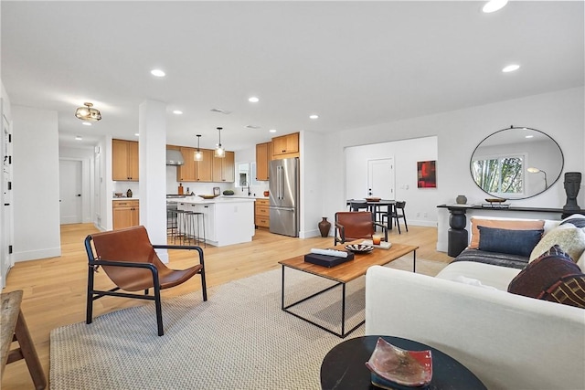 3119 Gibraltar Ave, Costa Mesa, CA 92626 - living room with light wood-style floors and recessed lighting