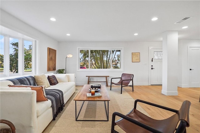 3119 Gibraltar Ave, Costa Mesa, CA 92626 - living room featuring plenty of natural light, recessed lighting, and light wood-style flooring