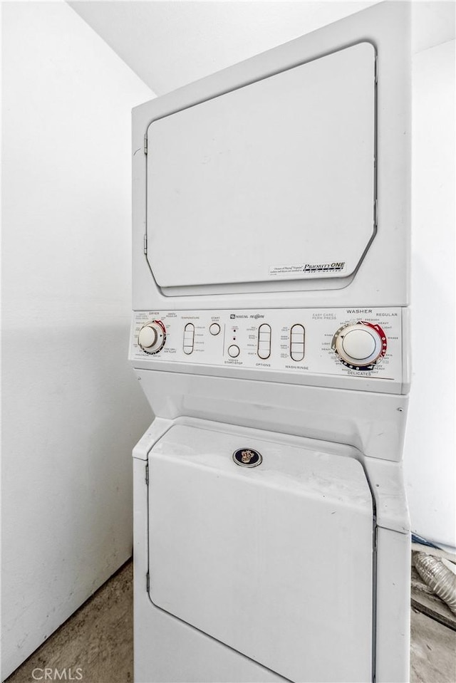 18051 Wakefield Ln Unit 106, Huntington Beach, CA 92648 - laundry room featuring stacked washer / drying machine