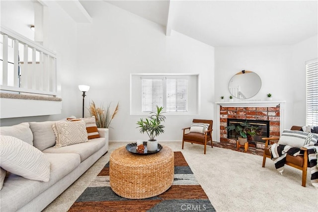 18051 Wakefield Ln Unit 106, Huntington Beach, CA 92648 - carpeted living room with a fireplace, beam ceiling, and high vaulted ceiling
