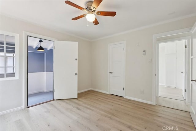2422 E 115th St, Los Angeles, CA 90059 - unfurnished bedroom with wood finished floors, ceiling fan, and a closet