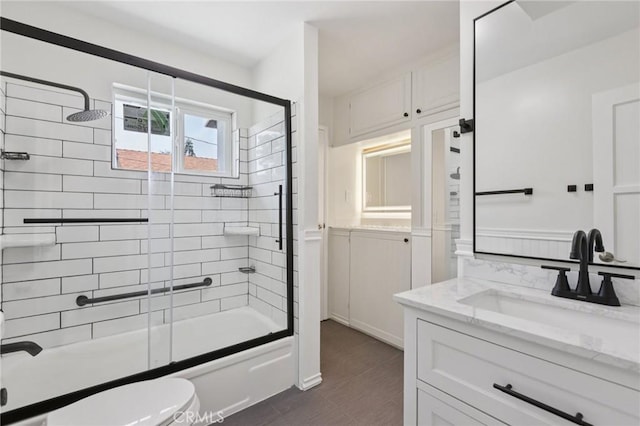 2422 E 115th St, Los Angeles, CA 90059 - full bath with vanity, combined bath / shower with glass door, and tile patterned flooring