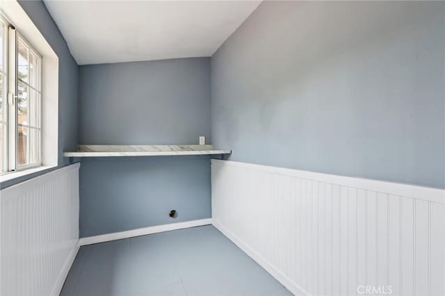 2422 E 115th St, Los Angeles, CA 90059 - empty room with a wainscoted wall