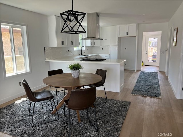 1350 Pleasant View Ave, Corona, CA 92882 - dining space with baseboards and light wood-style floors