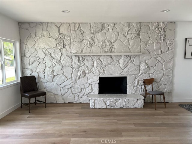 1350 Pleasant View Ave, Corona, CA 92882 - sitting room with a fireplace and wood finished floors