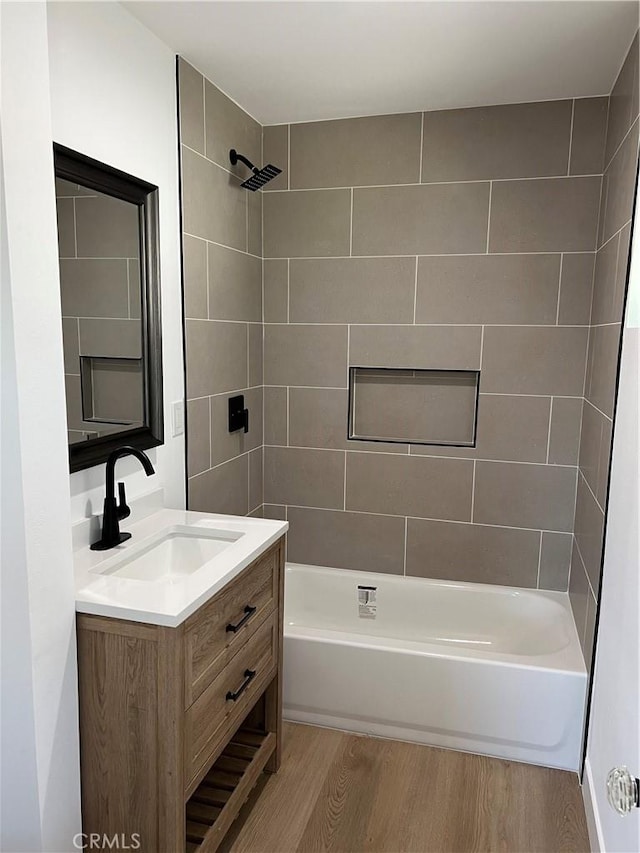1350 Pleasant View Ave, Corona, CA 92882 - bathroom featuring wood finished floors, vanity, and shower / washtub combination
