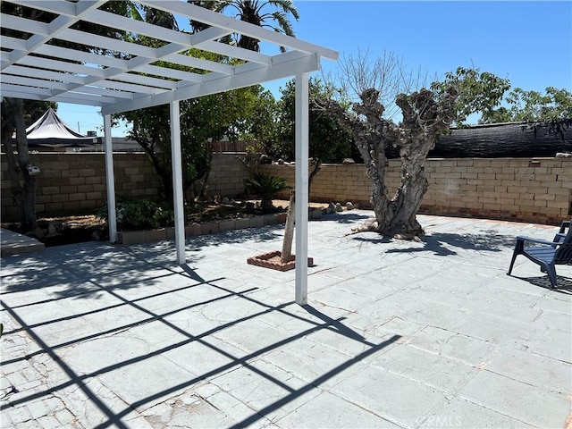 1350 Pleasant View Ave, Corona, CA 92882 - fenced backyard with a pergola and a patio area