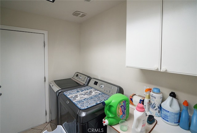 39269 Clear View Ct, Palmdale, CA 93551 - laundry area featuring washing machine and dryer and cabinet space